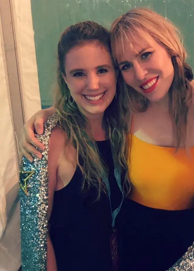 Ashley backstage with talent at an industry event